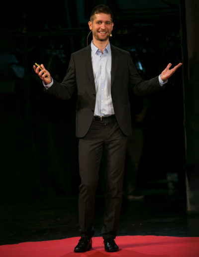 Peter Hajdu delivering his TEDx talk at TEDxMetropolitanUniversity in 2017.